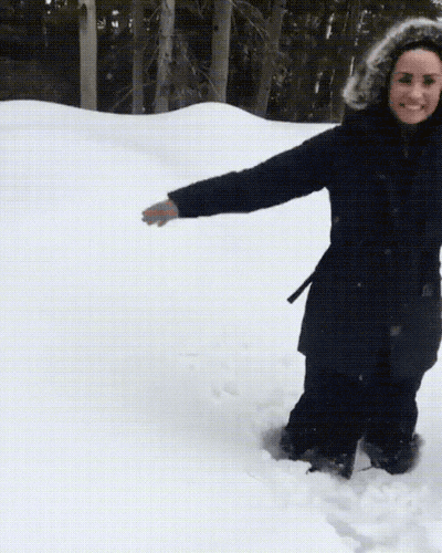 kicking snow gif