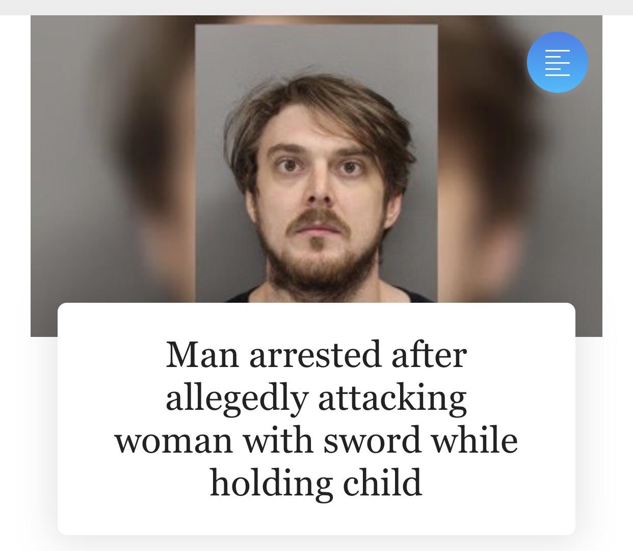 photo caption - Man arrested after allegedly attacking woman with sword while holding child