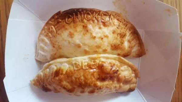 Empanadas that have what they’re filled with stamped into the crust.