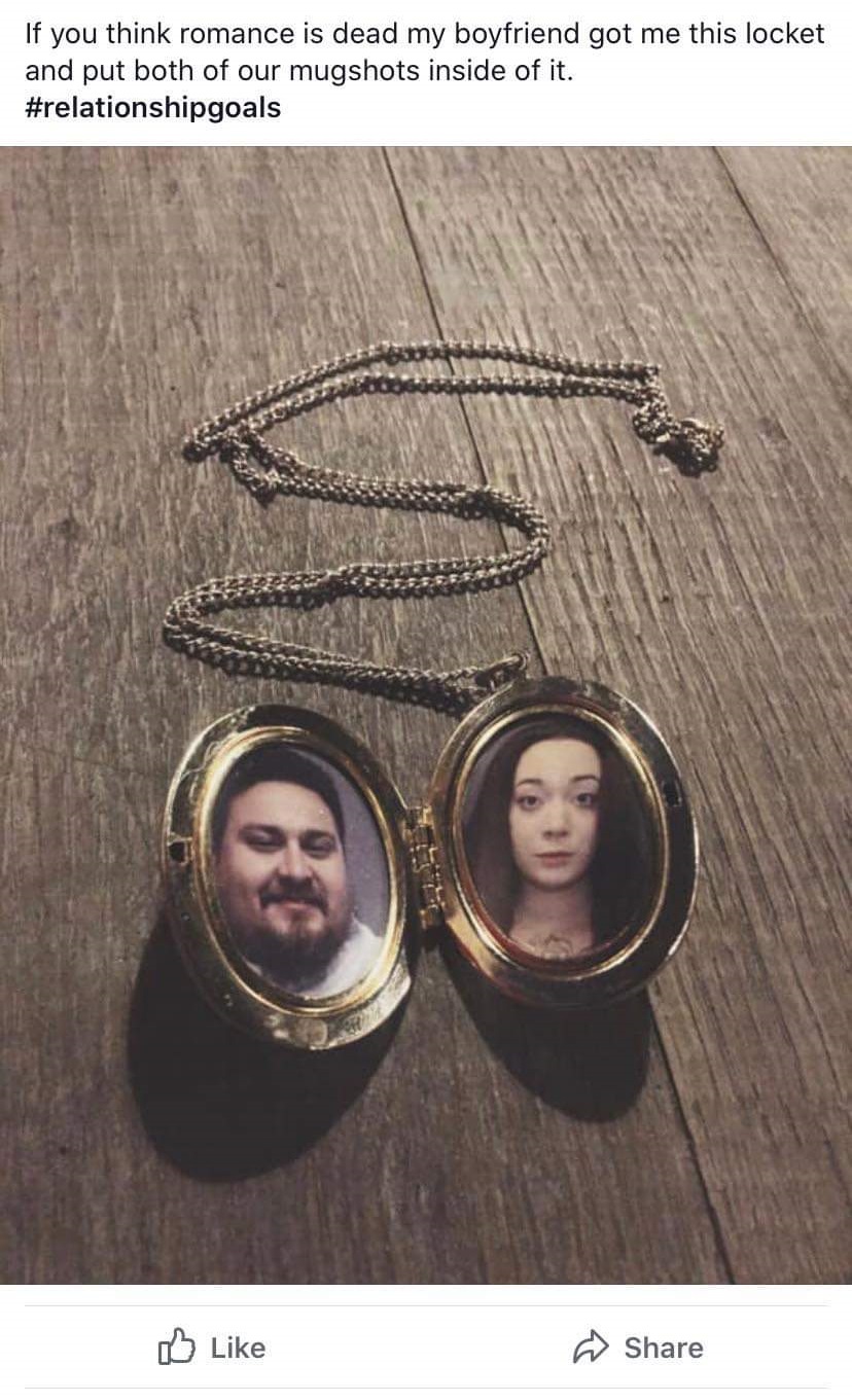 locket - If you think romance is dead my boyfriend got me this locket and put both of our mugshots inside of it.
