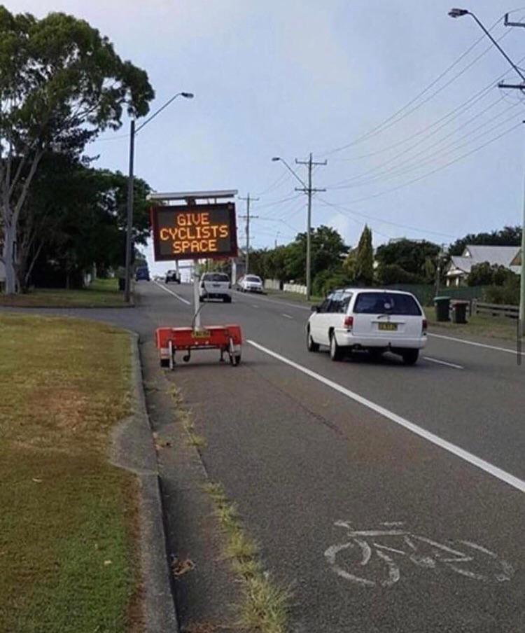 sign in bike lane - Give Cyclists Space