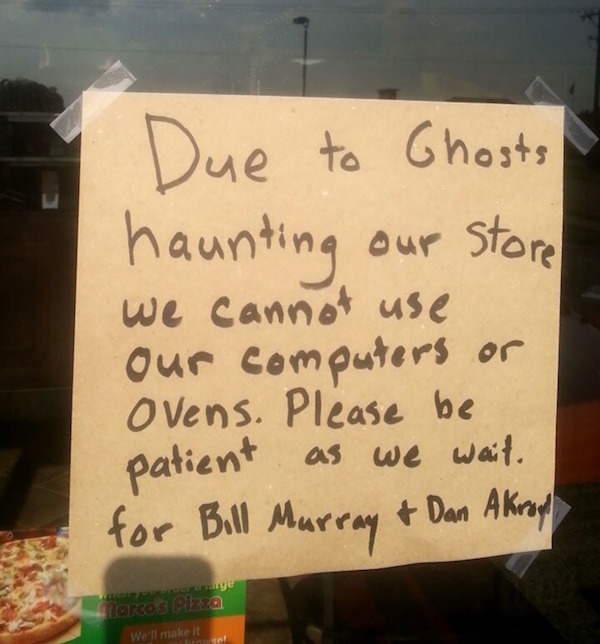 sign - Due to Ghosts haunting our store we cannot use Our computers or Ovens. Please be patient as we wait. for Bill Murray & Dan Akropl arcos Pla We'll maken