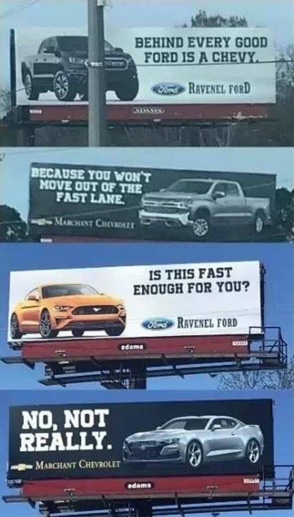 chevy ford billboard - Behind Every Good Ford Is A Chevy. Si Ravenel Ford Because You Won'T Move Out Of The Fast Lane Mrt Che Is This Fast Enough For You? Ravenel Ford No, Not Really Marchant Chevrolet