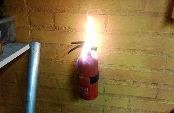 fire extinguisher catches fire - ,