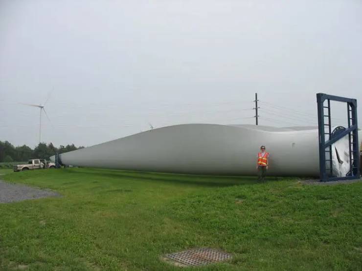 This is the size of a person next to a blade from a wind turbine