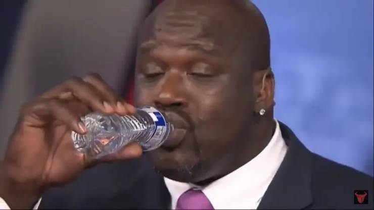 this is what Shaq looks like drinking a normal-sized bottle of water