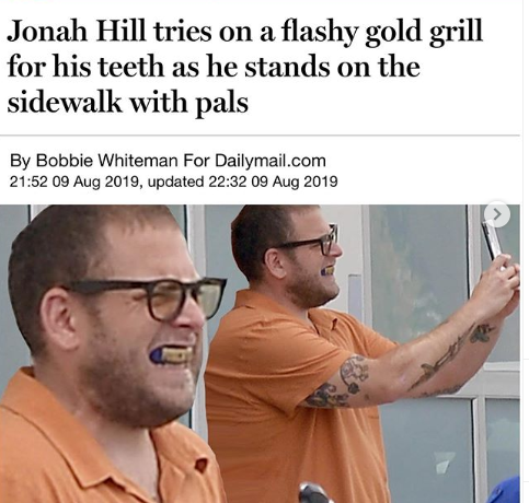 glasses - Jonah Hill tries on a flashy gold grill for his teeth as he stands on the sidewalk with pals By Bobbie Whiteman For Dailymail.com , updated