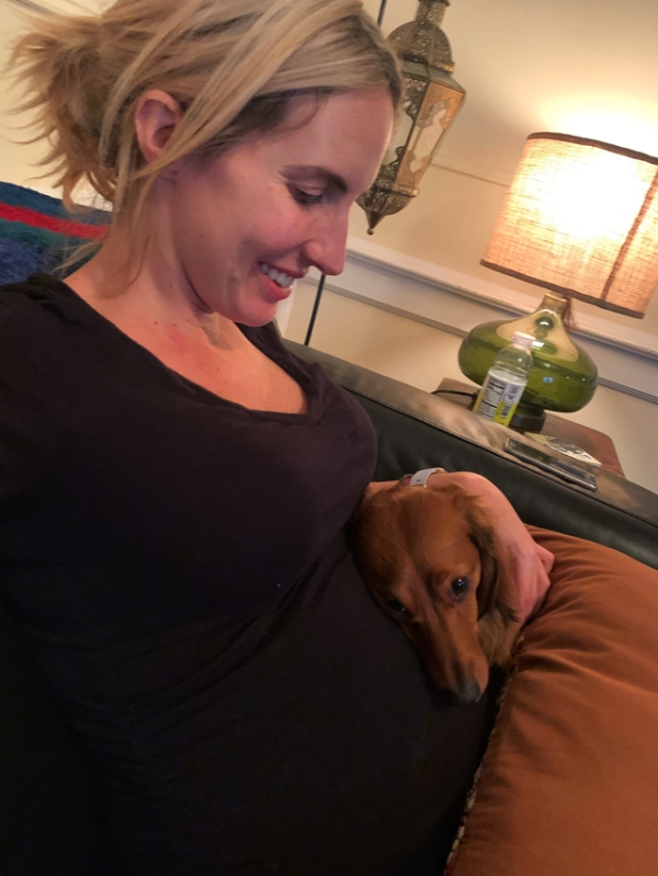 After four years of infertility, I’m 28 weeks pregnant. My dog, Arthur, loves to put his ear right on my belly. I think he can hear the baby’s heartbeat. And receive the occasional kick in the head. I’m so grateful, I never thought I’d be here