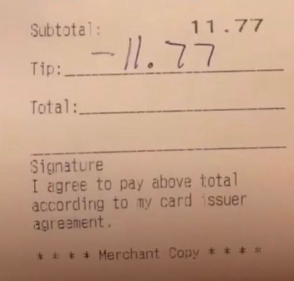 handwriting - Subtotal 11.77 Tip 11.77 Total_ Signature I agree to pay above total according to my card issuer agreement # Merchant Copy #