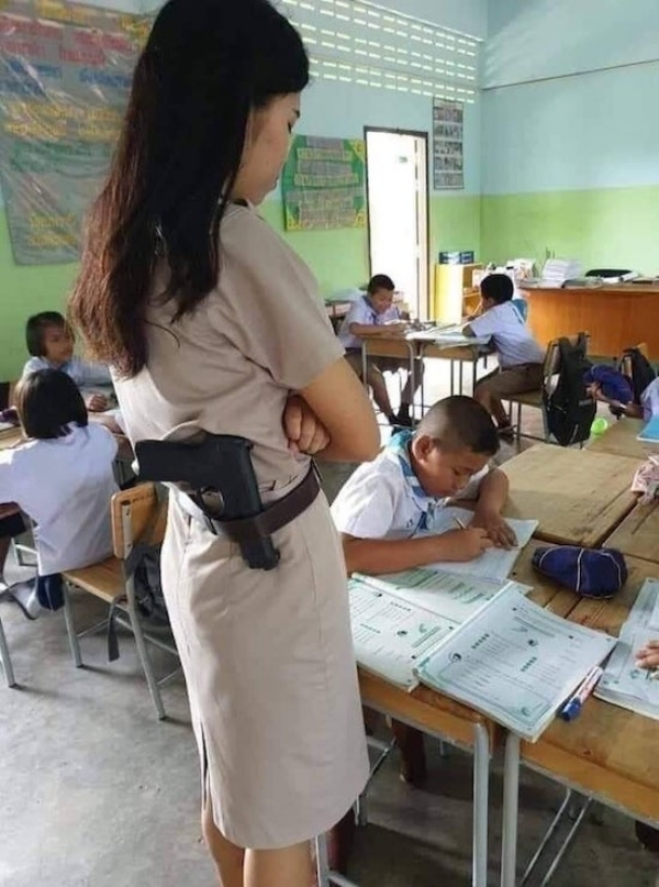 female teacher with a gun