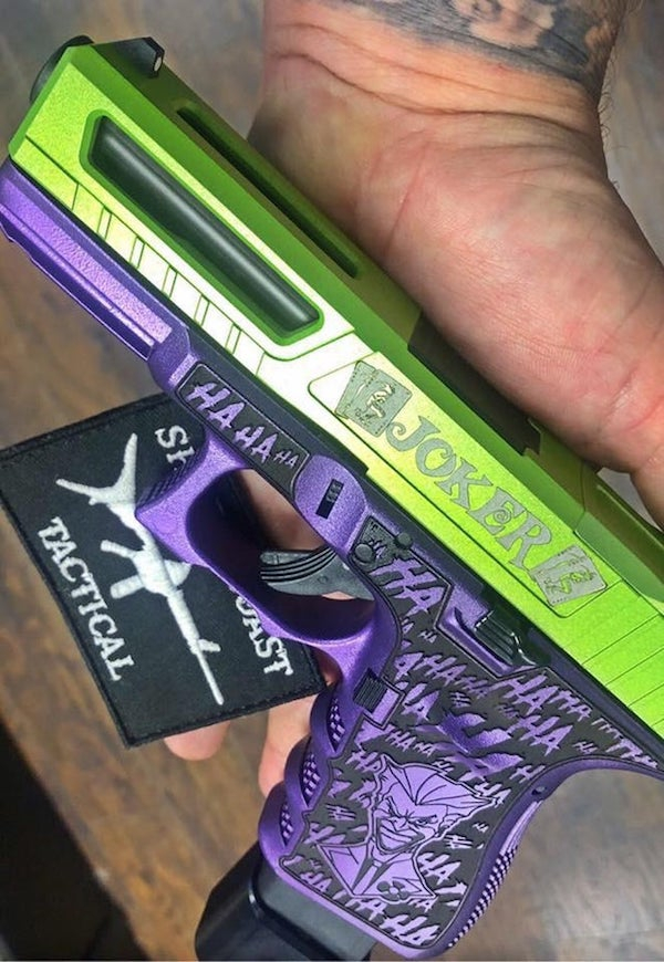 purple and green joker gun