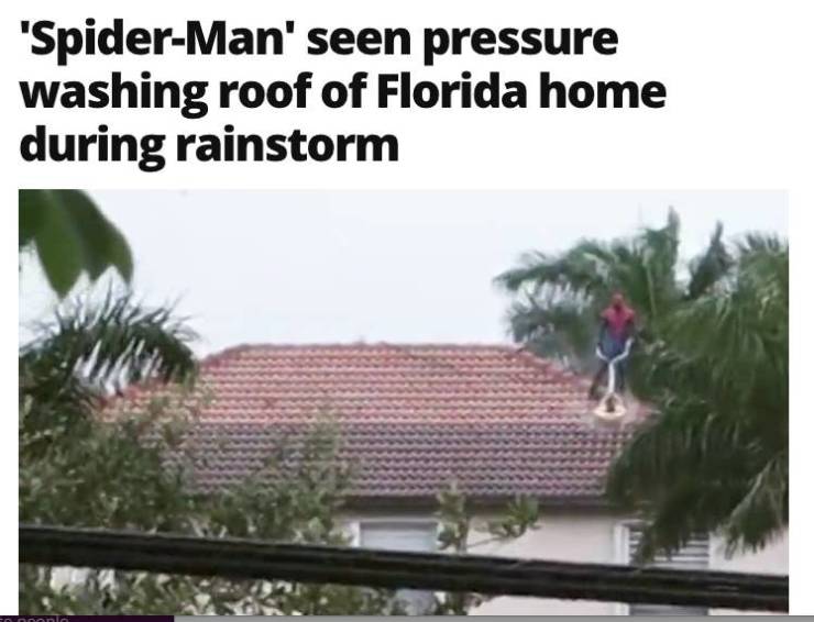 florida spider man pressure washing roof - 'SpiderMan' seen pressure washing roof of Florida home during rainstorm