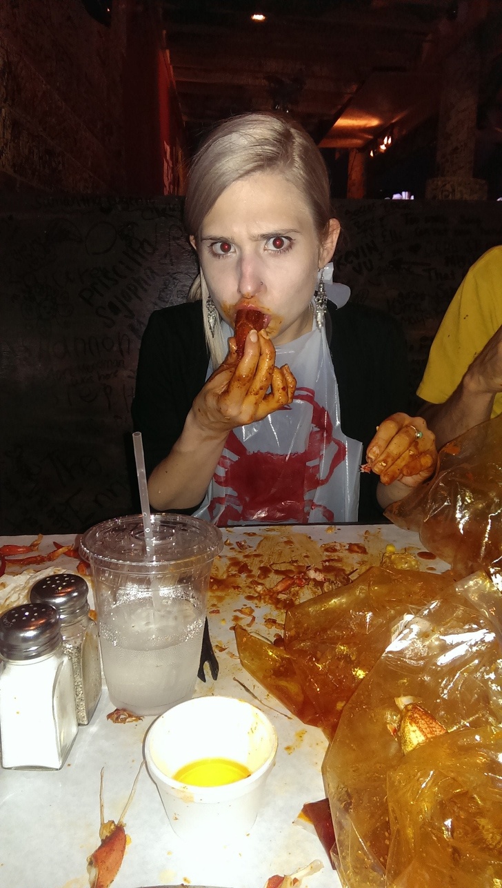 girl eating crawfish