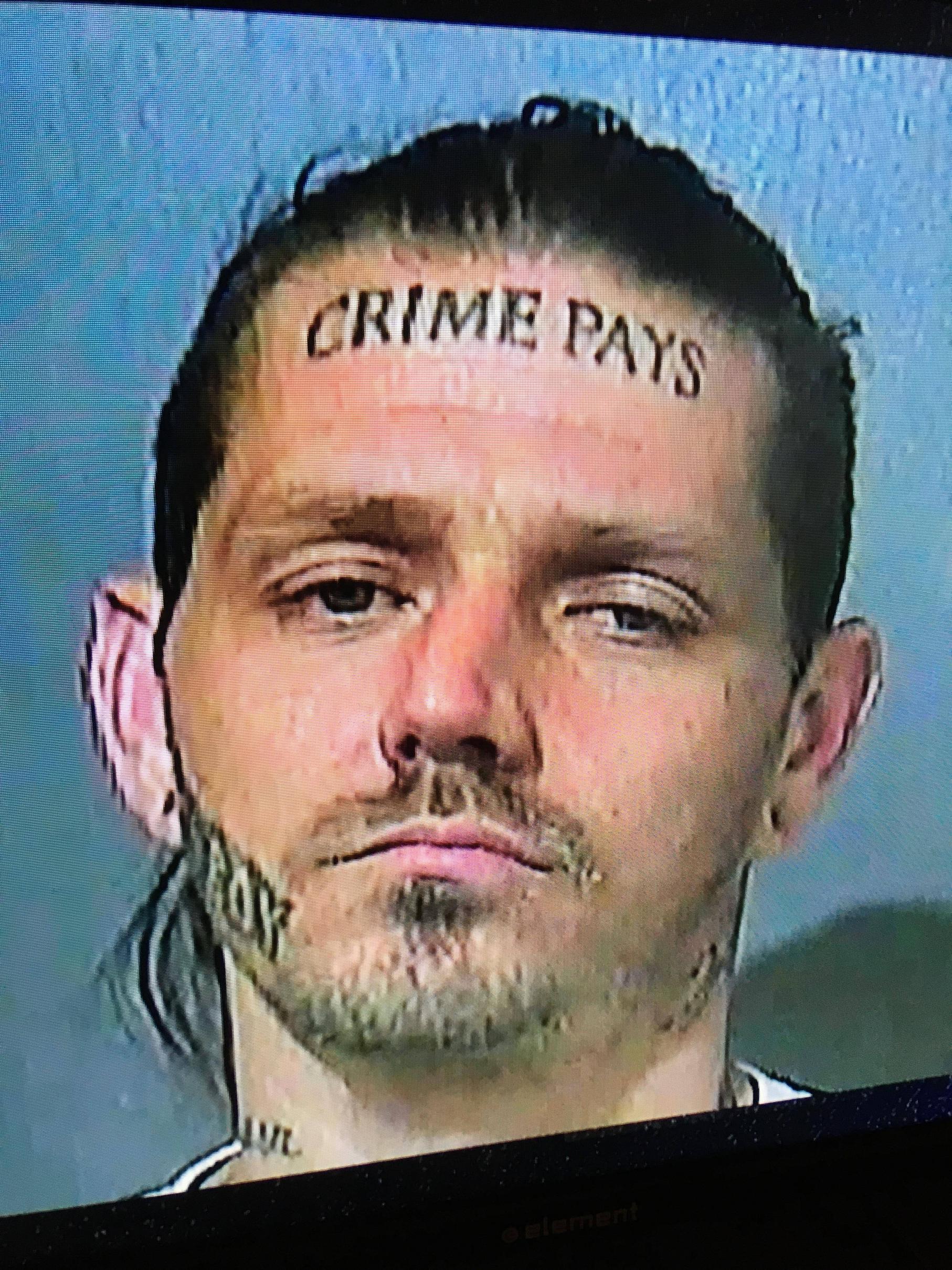 crime pays tattoo on forehead - Crime Pays