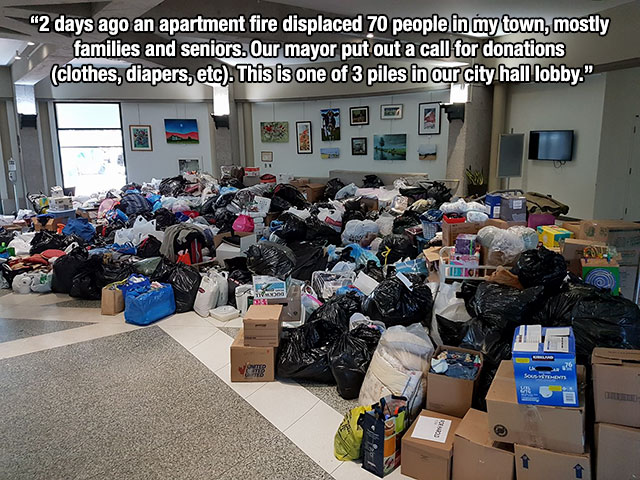 faith in humanity restored 2018 - "2 days ago an apartment fire displaced 70 people in my town, mostly families and seniors. Our mayor put out a call for donations clothes, diapers, etc. This is one of 3 piles in our city hall lobby."