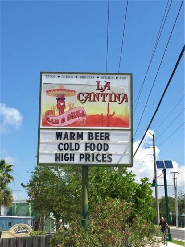 billboard - Tacos Wings Mirgers Steaks Tish La Cantina Warm Beer Cold Food High Prices