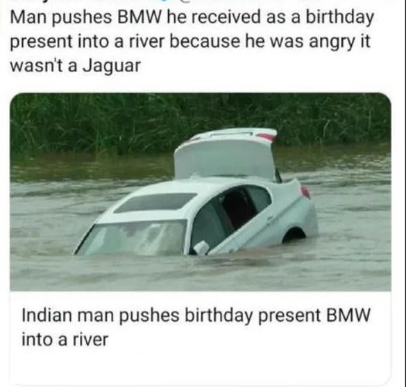 man pushes bmw into river - Man pushes Bmw he received as a birthday present into a river because he was angry it wasn't a Jaguar Indian man pushes birthday present Bmw into a river