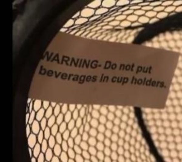 mildly infuriating things - Warning Do not put beverages in cup holders.