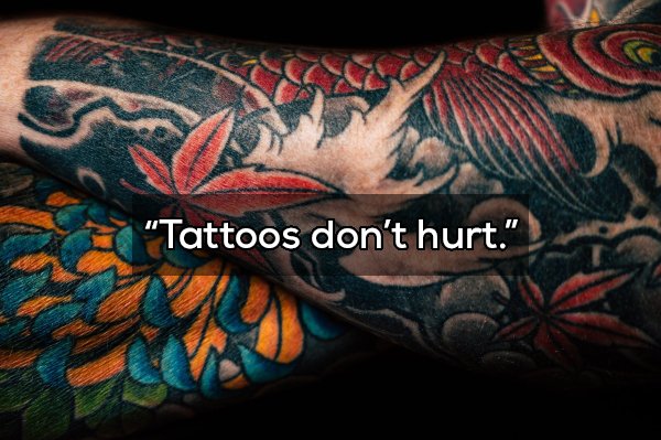 tattoo close photography - Tattoos don't hurt." .