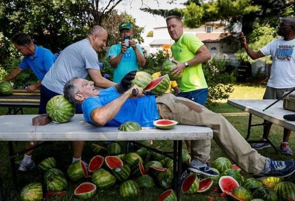 Most watermelons sliced open on a stomach.
The record was set by Bipin Larkin, who cleanly cut through 48 watermelons using a machete, in 1 minute.