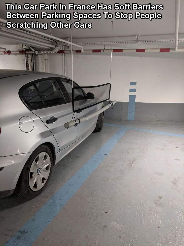 This Car Park In France Has Soft Barriers Between Parking Spaces To Stop People Scratching Other Cars