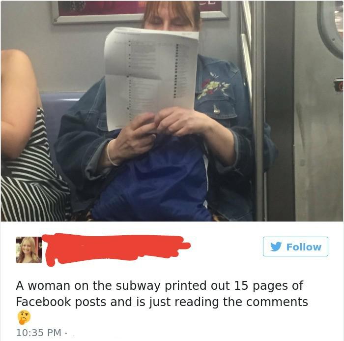 woman reading facebook comments printed out - y A woman on the subway printed out 15 pages of Facebook posts and is just reading the