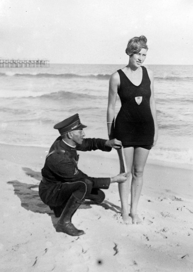 police measuring swimsuit