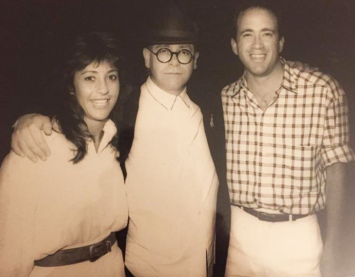 “My parents with Elton John, circa 1988”