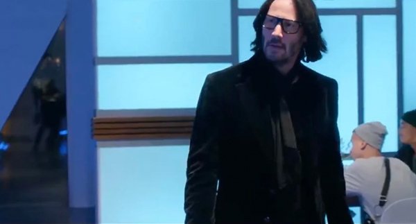 During the Keanu Reeves reveal scene in the movie ‘Always Be My Maybe’ (2019) the camera man’s reflection can be seen on the left.