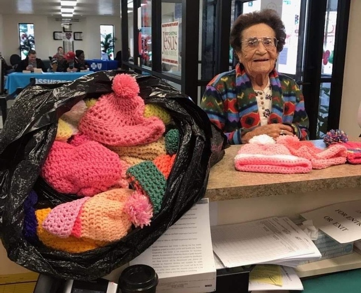 woman brings a bag of hats