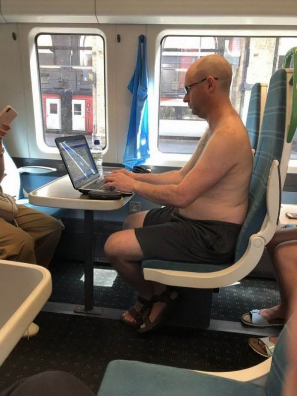 shirtless man on train