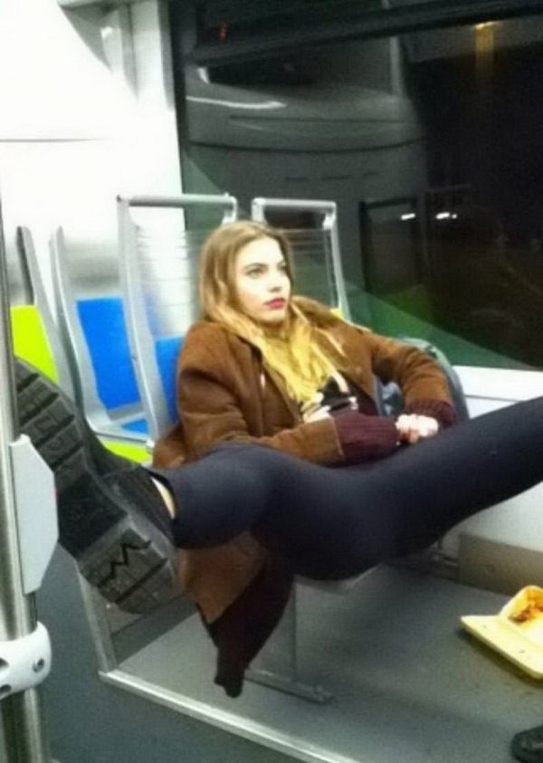 girl sitting with legs spread public