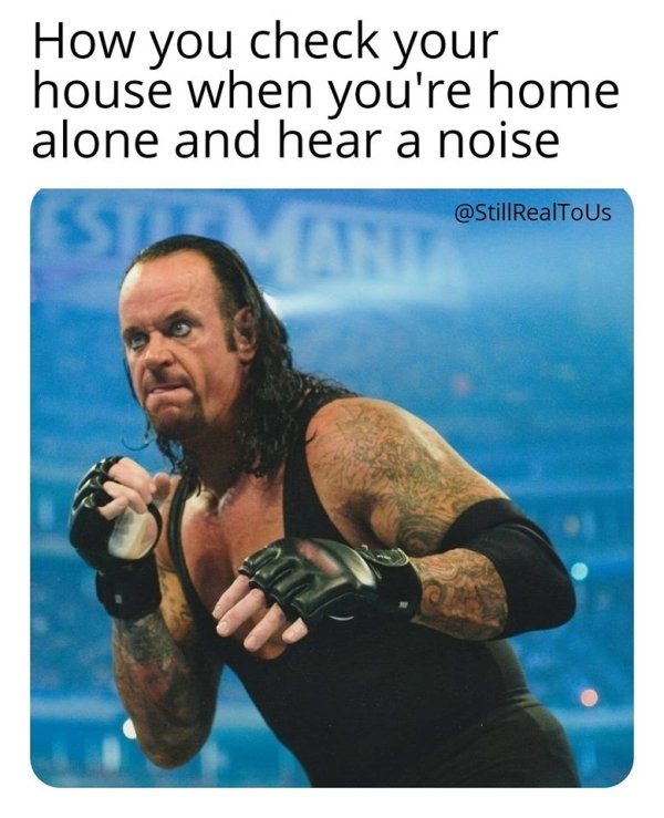 photo caption - How you check your house when you're home alone and hear a noise