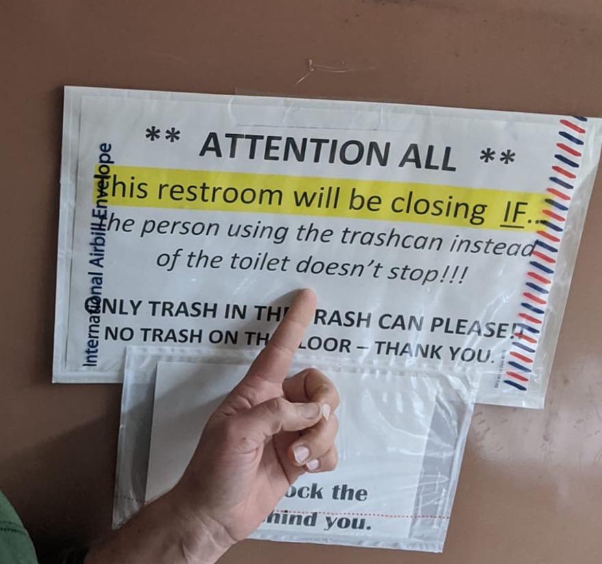 hand - $ bilt Envelope Attention All Ghis restroom will be closing If. he person using the trashcan instead of the toilet doesn't stop!!! International Airb Only Trash In The Rash Can Please No Trash On Th Loor Thank You. ock the hind you.