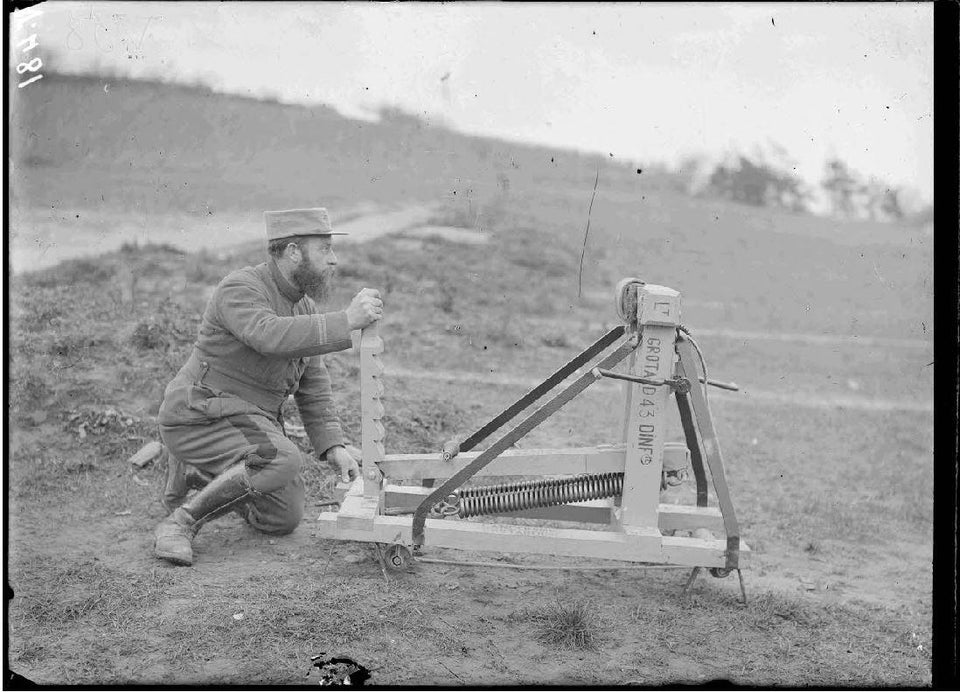 French soldier poses with his DIY grenade launcher, France, 1916.