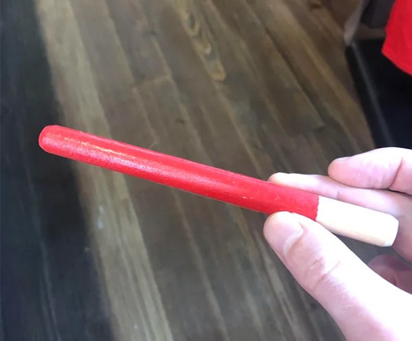This red stick is used by field workers to harvest peppers for Tabasco sauce only when they’re perfectly ripe.