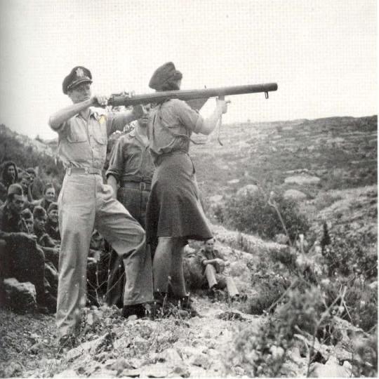 U.S. Officer Teaches a Female Yugoslavian Partisan How to Fire a Bazooka, 1944
