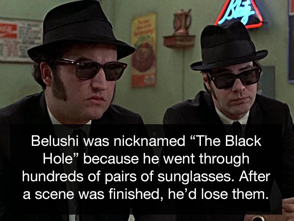 photo caption - Belushi was nicknamed The Black Hole" because he went through hundreds of pairs of sunglasses. After a scene was finished, he'd lose them.