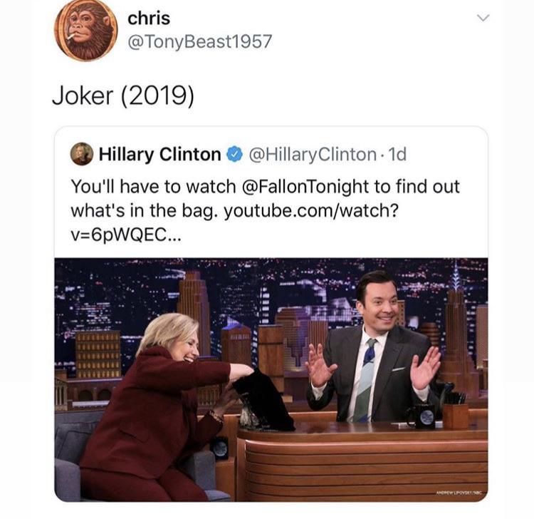 presentation - chris Joker 2019 Hillary Clinton Clinton. 1d You'll have to watch to find out what's in the bag. youtube.comwatch? v6pWQEC... Wine