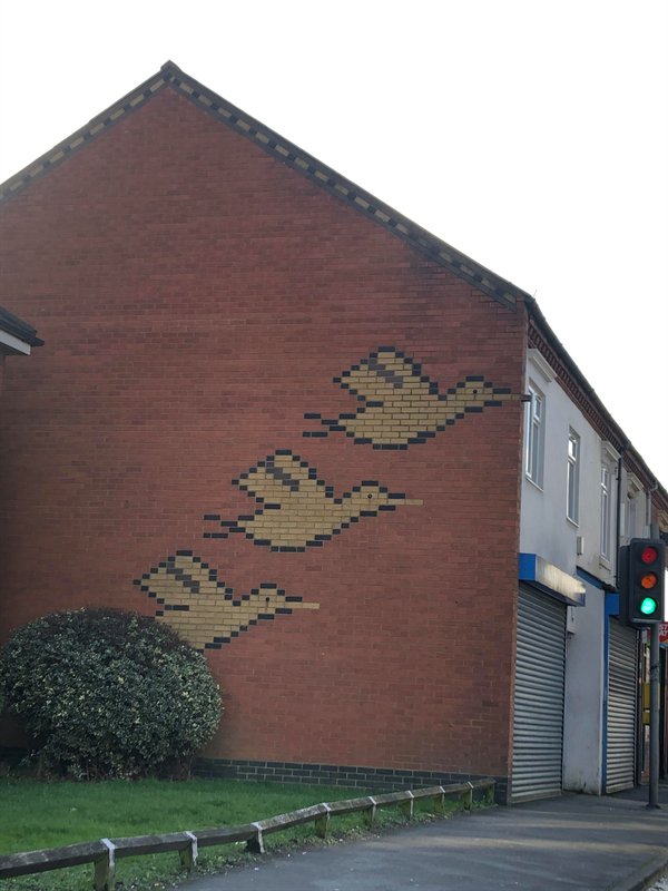 “A house near me has birds on the brickwork and the one has a single brick sticking out as it’s beak.”