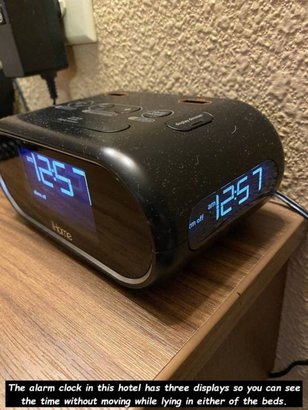 Clock - 2767 Am off The alarm clock in this hotel has three displays so you can see Pof the beds.ee the time without moving while lying in either of the beds.