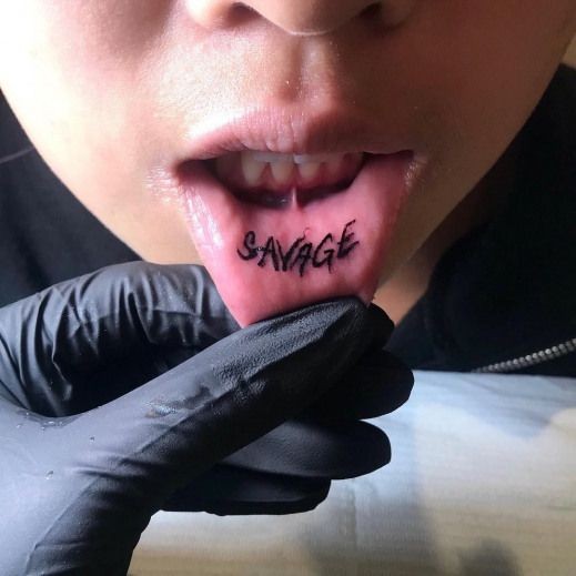 savage lip tattoo - Savage