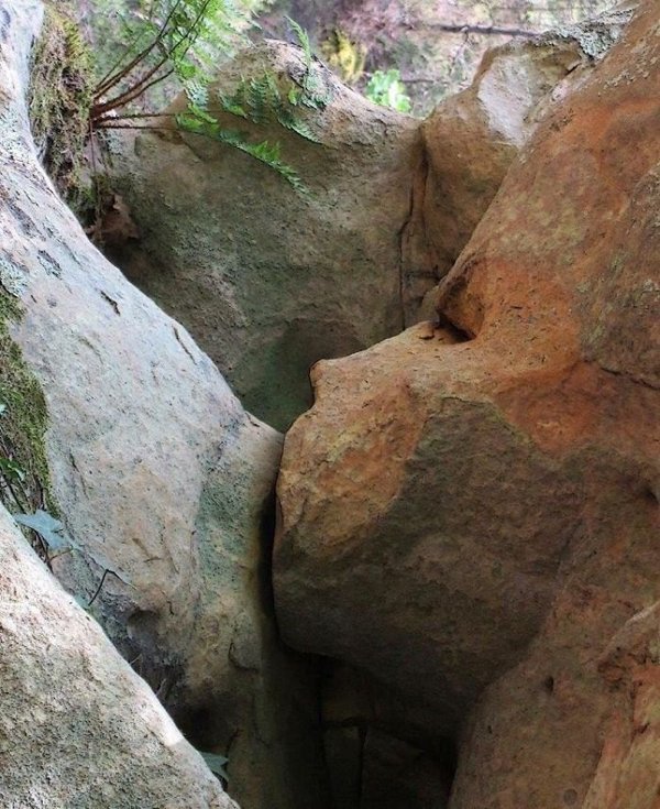 Two rocks looking like a mother breastfeeding her child.