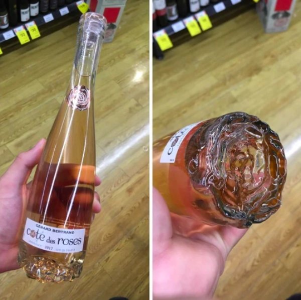 rosé bottle with rose on bottom - Hard Berthand cate des ro e des roses