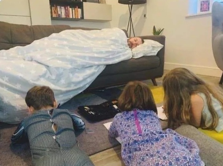 Dad challenges his children to draw him sleeping, so he can take a nap.