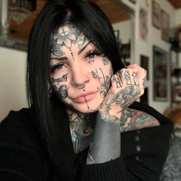 tattooed face model