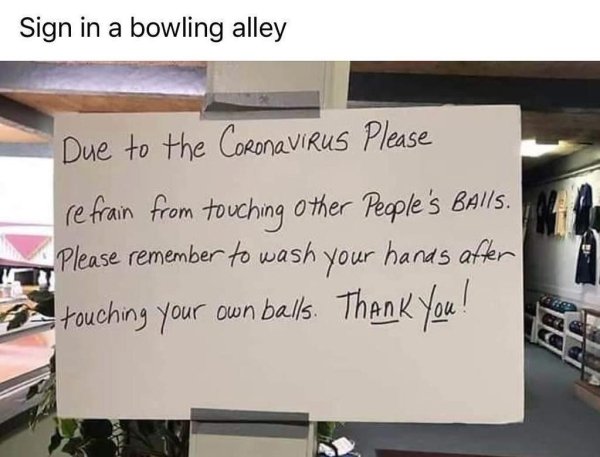 Sign in a bowling alley - Due to the Coronavirus Please refrain from touching other People's Balls. Please remember to wash your hands after touching your own balls. Thank you!