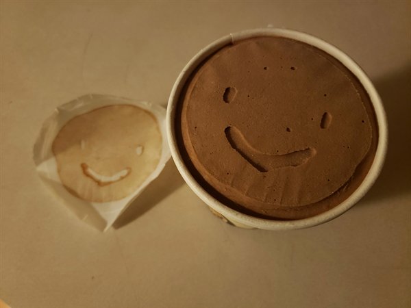 chocolate ice cream with a smile on it