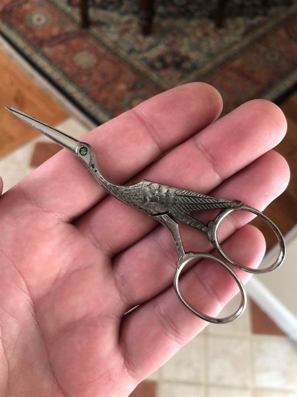 fancy metal scissors shaped like a bird