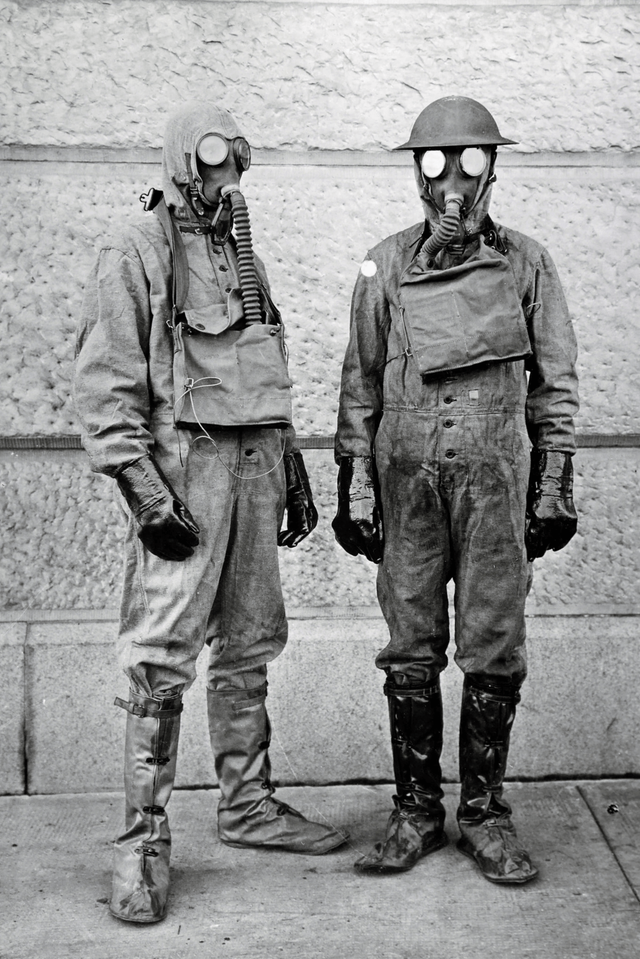 U.S. soldiers in protective suits at a wartime chemical weapons research center at American University in Washington D.C. (1918)